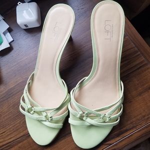 Light green strappy heeled sandals